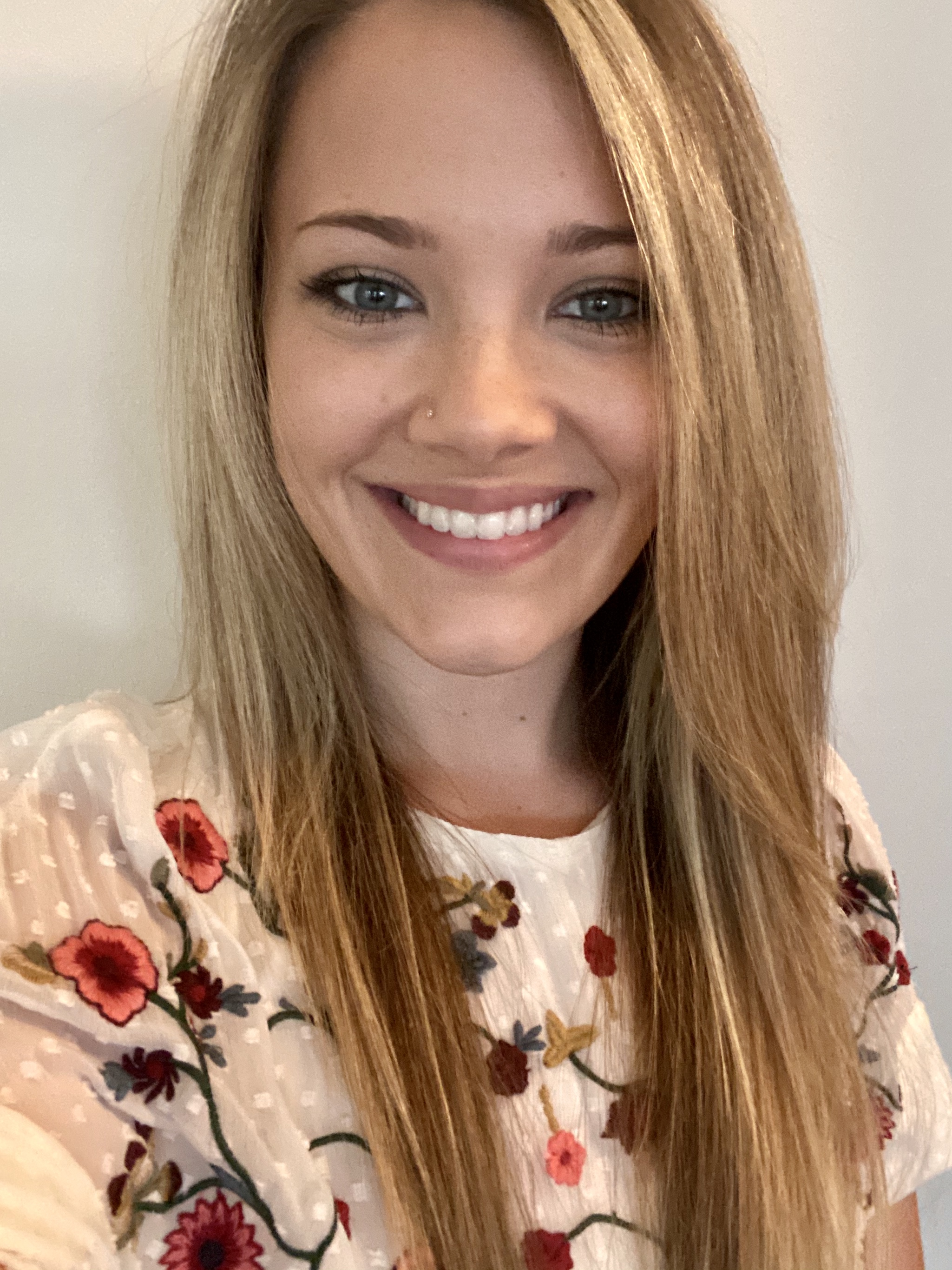 a profile picture of Anna Notestine, a speaker at the conference.